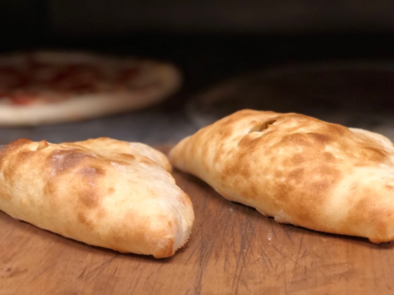 Golden baked calzones