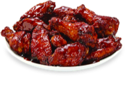 A plate of sauced chicken wings